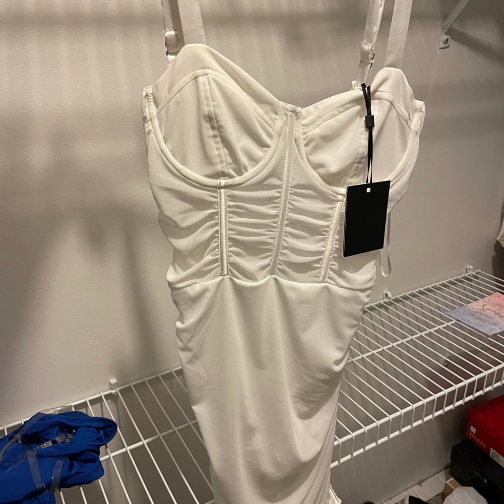 Brand new white see through dress never worn.